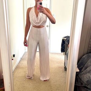 Champagne colored wide leg jumpsuit. NWT, never been worn.